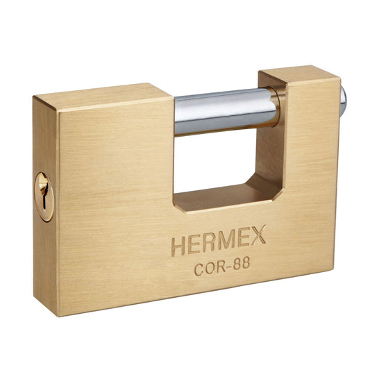 Candado antipalanca 88mm con cuerpo de latón y llave tradicional HERMEX. Alta resistencia al corte y palanca. Ideal para uso exterior e industrial