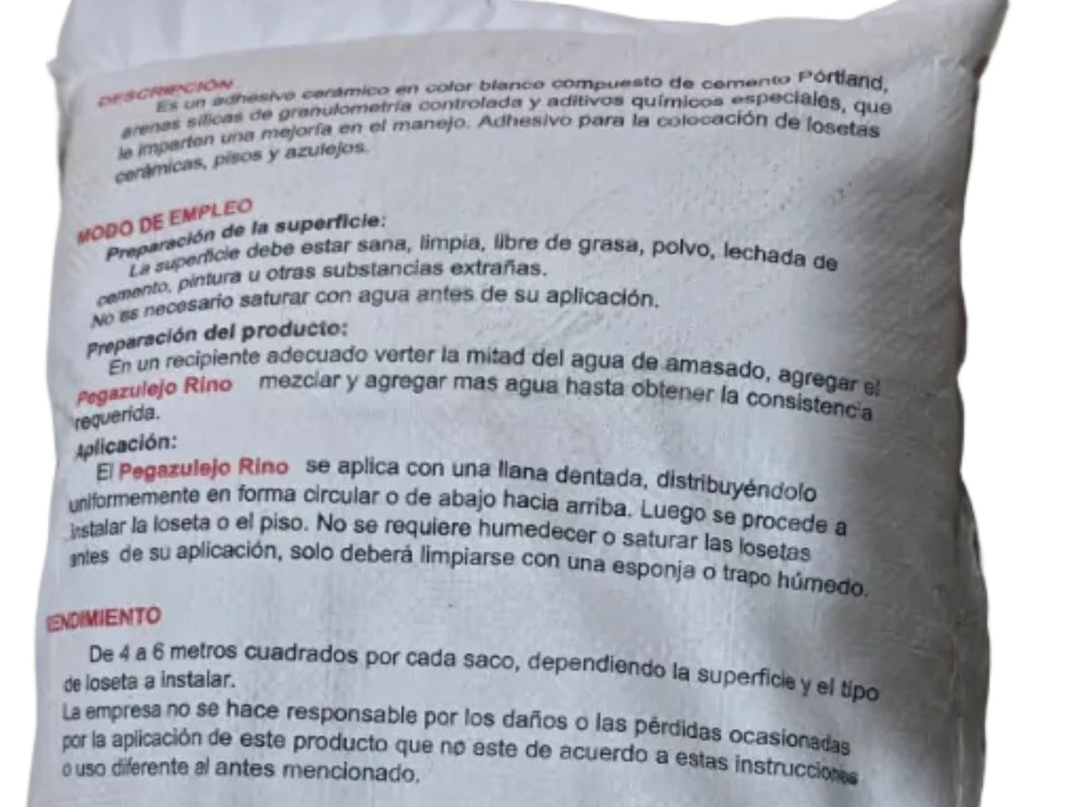 Modo de empleo y rendimiento impresos en el saco de Pegazulejo Rino de 20 kg